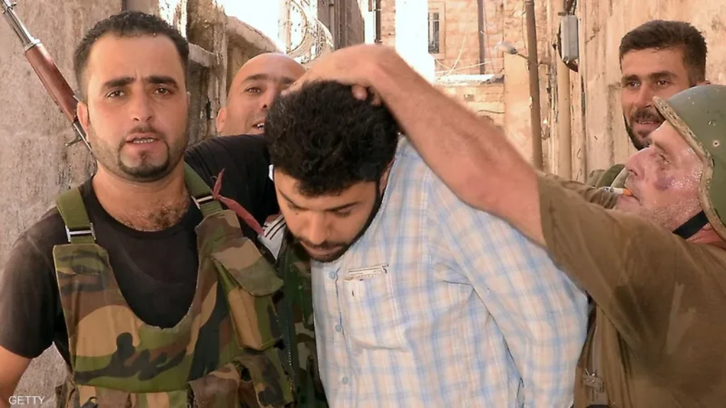 إحداها مشاهدة المظاهرات.. وثائق تكشف أغرب7 حالات اعتقال بسجون الأسد (فيديو)