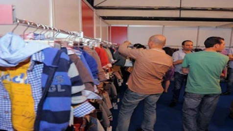 في بغداد: بيع ألبسة بعد تدمير حلب ومعرض للزهور بعد مجزرة النبك!