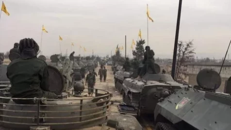شاهد دبابات أمريكية في عرض عسكري "مستفز" لحزب الله في القصير وردة الفعل الصادمة عليه 