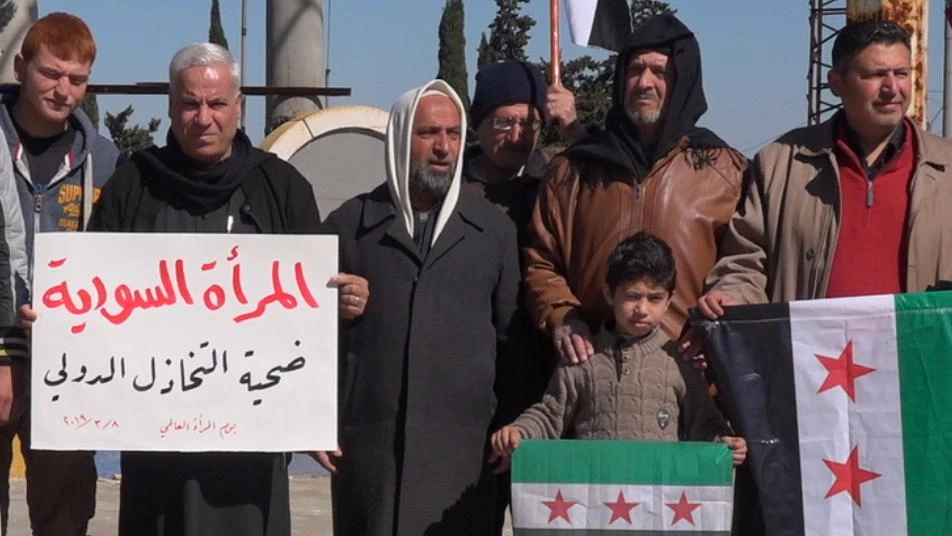 وقفة تضامنية لأجل معتقلات سوريا في يوم المرأة العالمي بحلب (صور)