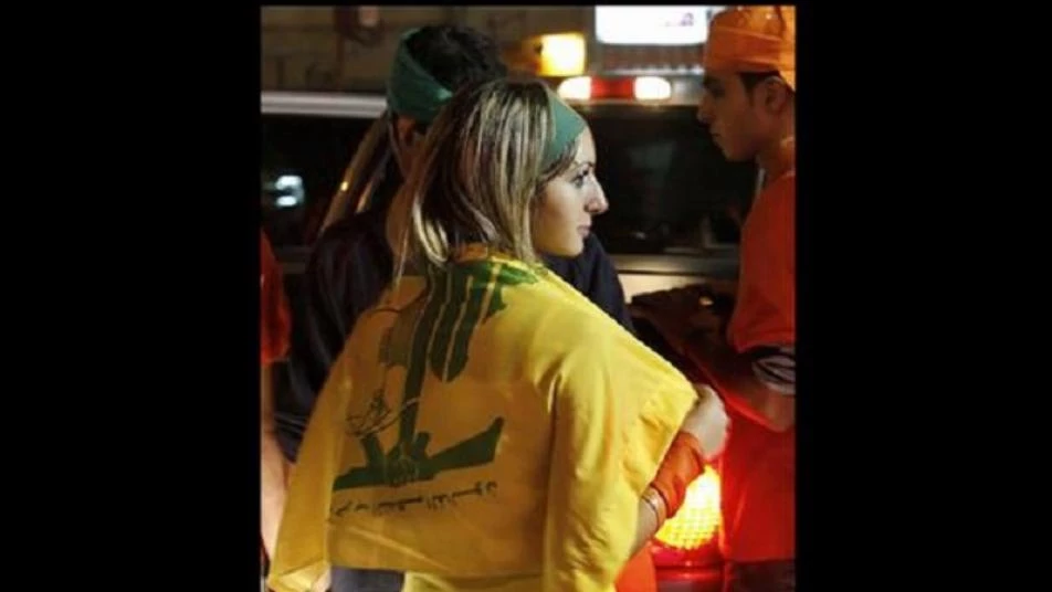 "فتاة كباريه" روسية تشعل حرباً حقيقية في معقل "حزب الله" بلبنان (فيديو)