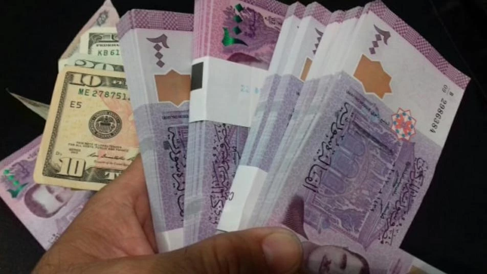 سعر جديد لليرتين السورية والتركية أمام الدولار