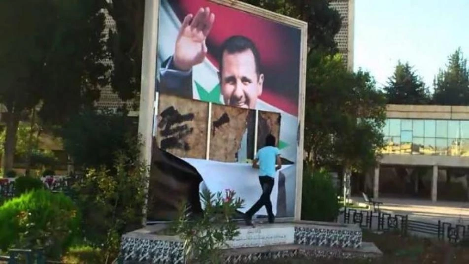 تمزيق صور لـ"بشار الأسد" في عقر دار ميليشيات إيران بدمشق