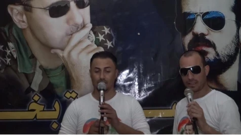 فرقة من شبيحة النظام المصابين "تعفّش" لحن أغنية معارضة من أجل تأييد بشار (فيديو)