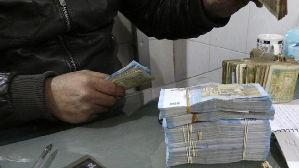 سعر جديد لصرف الليرة السورية مقابل الدولار