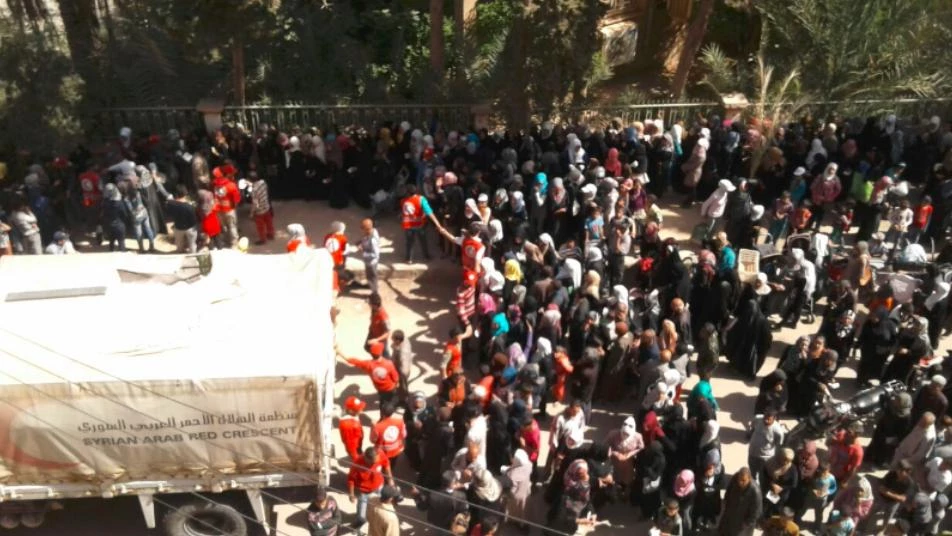 ميليشيات أسد وإيران تسطو على شاحنات للهلال الأحمر في البوكمال