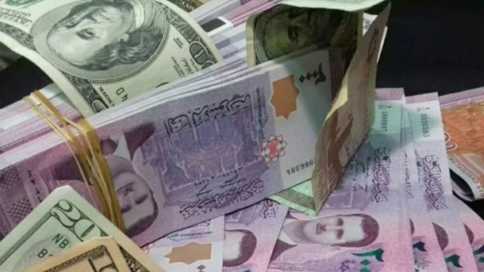 الليرة السورية تواصل تراجعها أمام الدولار