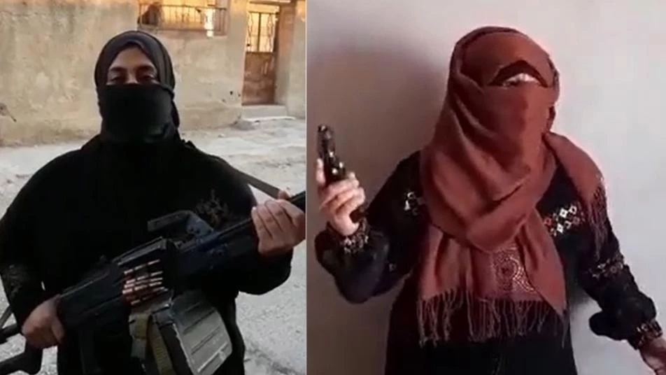 سيدتان تحملان السلاح و تستنهضان همم الرجال وتستنفران حرائر درعا بالموت ولا المذلة (فيديو)