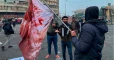 Protests grip Iraq's capital and south to defy slaughter in Baghdad