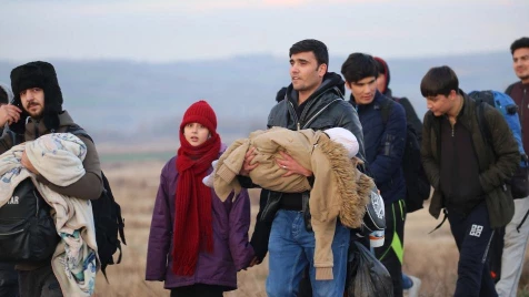 Refugees head for EU as Turkey opens borders