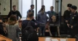 Russian court jails seven activists