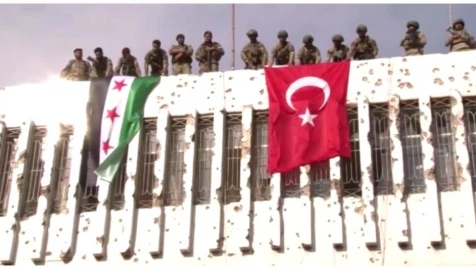 Syrian opposition and Turkish flags wave in Raqqa's Ras al Ain
