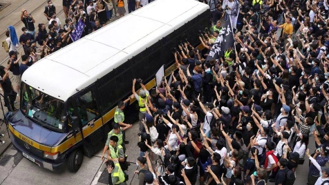 Pro-democracy protesters take to Hong Kong streets