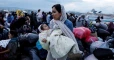 Prior to Syria military operation, Greece expands refugee transfers (Photos)