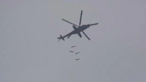 Assad helicopters drop barrel bombs on Latakia countryside