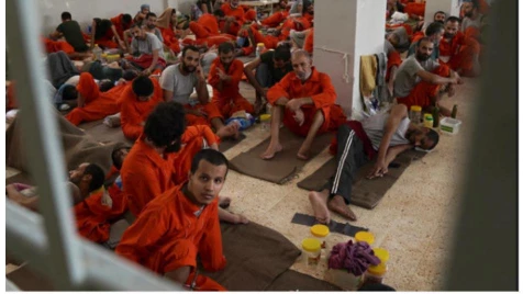 ISIS suspects in overcrowded Syrian prison tell CBS News they're Americans