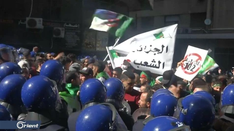 Army warns as thousands march against Algeria's Bouteflika  