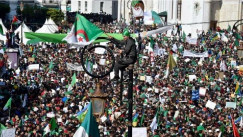 Hundreds of thousands march against Algeria's Bouteflika