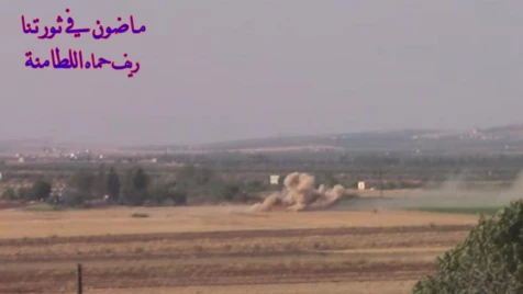 Assad militiamen shell Hama northern countryside