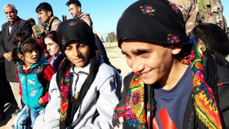 Yazidis freed from ISIS captivity in Syria, return to Iraq