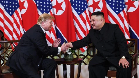 Trump shakes hands with North Korea leader Kim