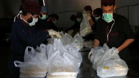 Syrians dig, cook, fill sandbags in war against Assad