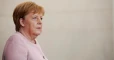 Merkel says Germany will lift Russia sanctions if Ukraine's sovereignty restored