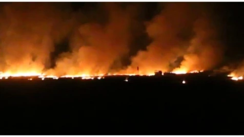 Russian warplanes burn farmlands in Idlib's Khan Sheikhoun
