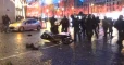 Protesters on Champs Elysees attack policemen 