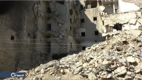 In Aleppo, bodies still under rubble caused by Assad bombing