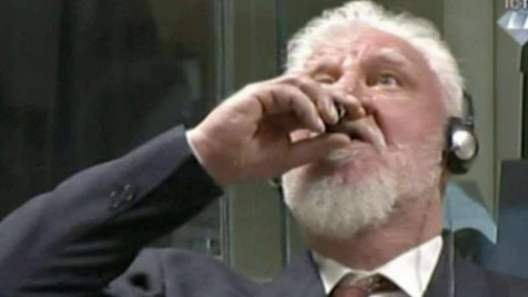 Bosnian Croat war criminal ’drinks poison’ in court