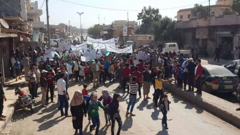 Syrians take to streets to mark "day of rage"  