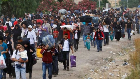 Syrians flock home from Turkey for Eid despite danger