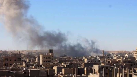 US coalition warplanes kill tens of displaced families ‎in Raqqa