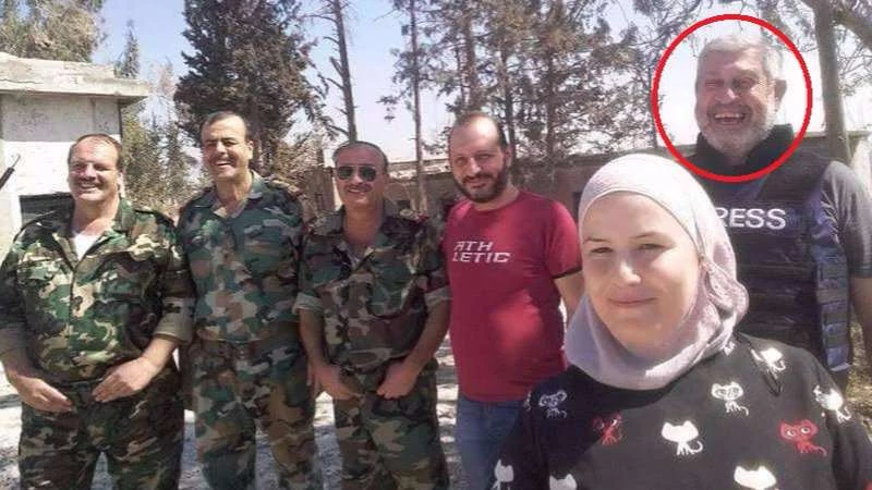 Smiling from ear to ear, BBC correspondent in Syria poses with Assad terrorists