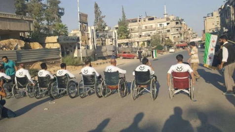 Far from Rio, a paralympic race in besieged Syrian town
