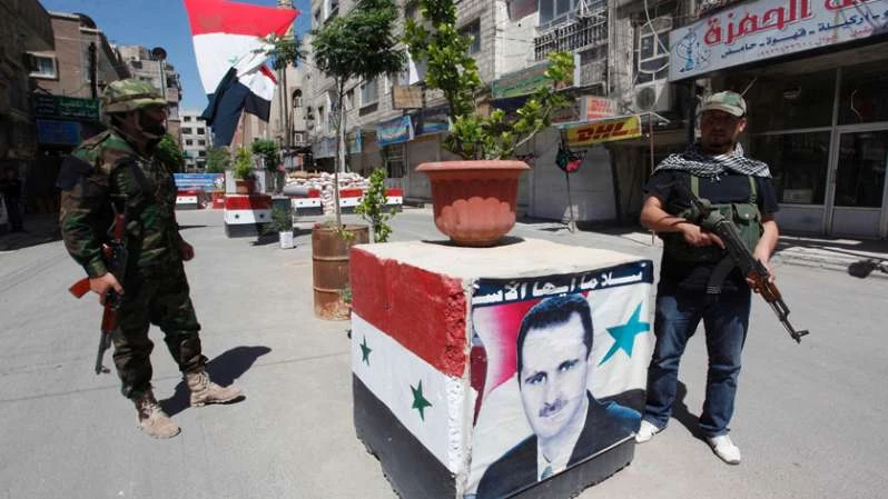 Assad checkpoints; pay more, pass quicker