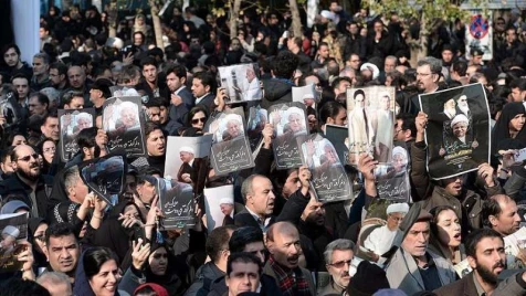 Ex-Iran president’s funeral turns into political rally