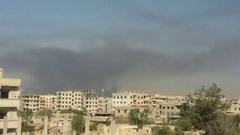 Assad airstrikes hit Douma, black smoke covers Jobar  