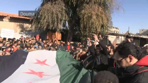 Syrians take to streets to renew their demands of toppling Assad