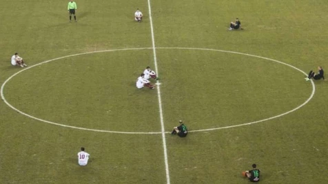 Greek match delayed as players stage sit-down protest over migrant deaths