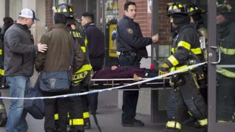 New York train crashes at end of platform; 100 people injured