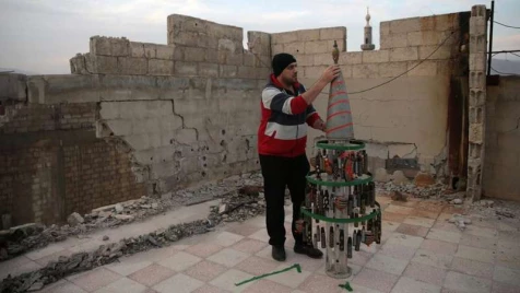 In Syria’s Douma, a Christmas ’tree’ made from empty shells