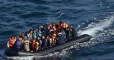 Rescuers watch 31 refugees drown in the Aegean Sea fearing charges with people smuggling
