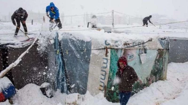 Two children die as snow piles misery on displaced Syrians