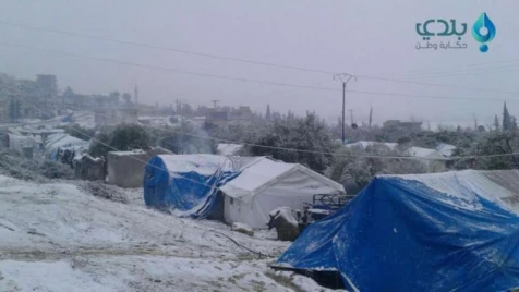 Snowfall brings black days for Idlib’s refugee camps